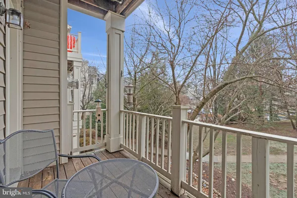 a view of a chairs on wooden deck