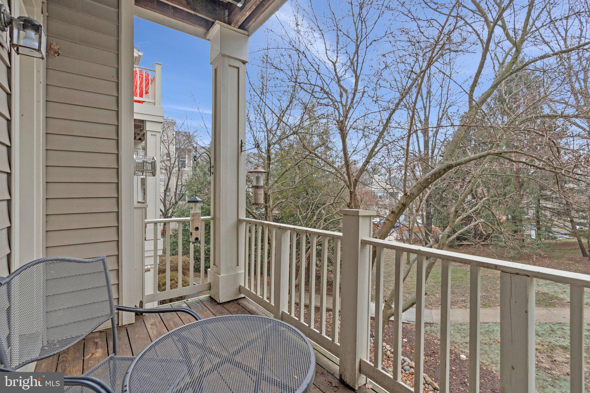 11405 Windleaf Court, Unit 23 Reston, VA 20194 - Photo 21 of 24 a view of a balcony with a pot