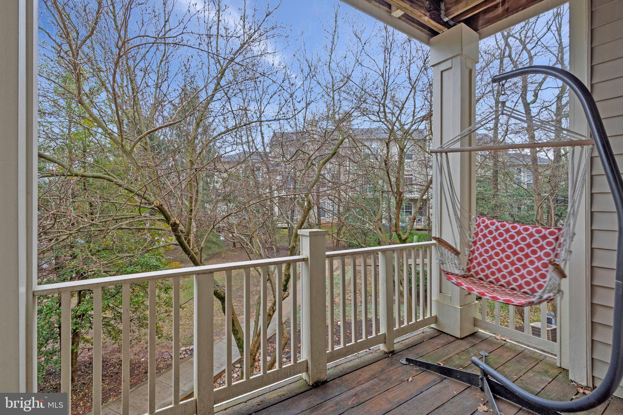 11405 Windleaf Court, Unit 23 Reston, VA 20194 - Photo 23 of 24 a view of a chairs on wooden deck