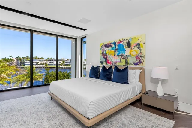 a view of a chairs and table on the wooden deck