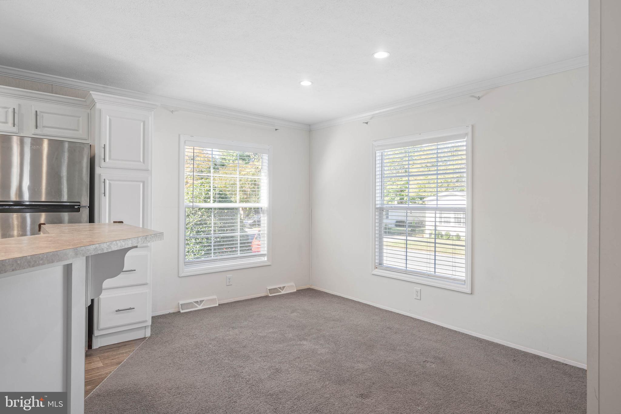 17247 Pine Water Drive Lewes, DE 19958 - Photo 11 of 32 a view of an empty room with a window