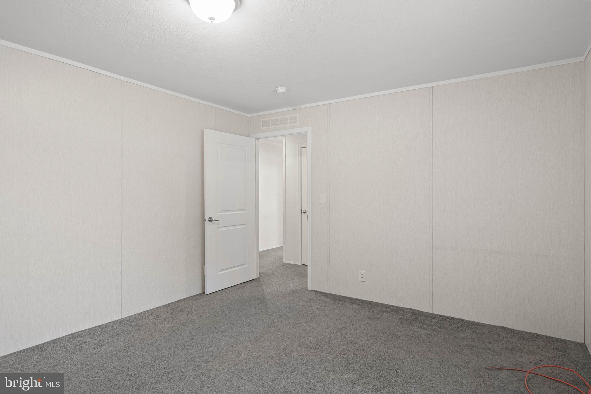 17247 Pine Water Drive Lewes, DE 19958 - Photo 17 of 32 a view of an empty room