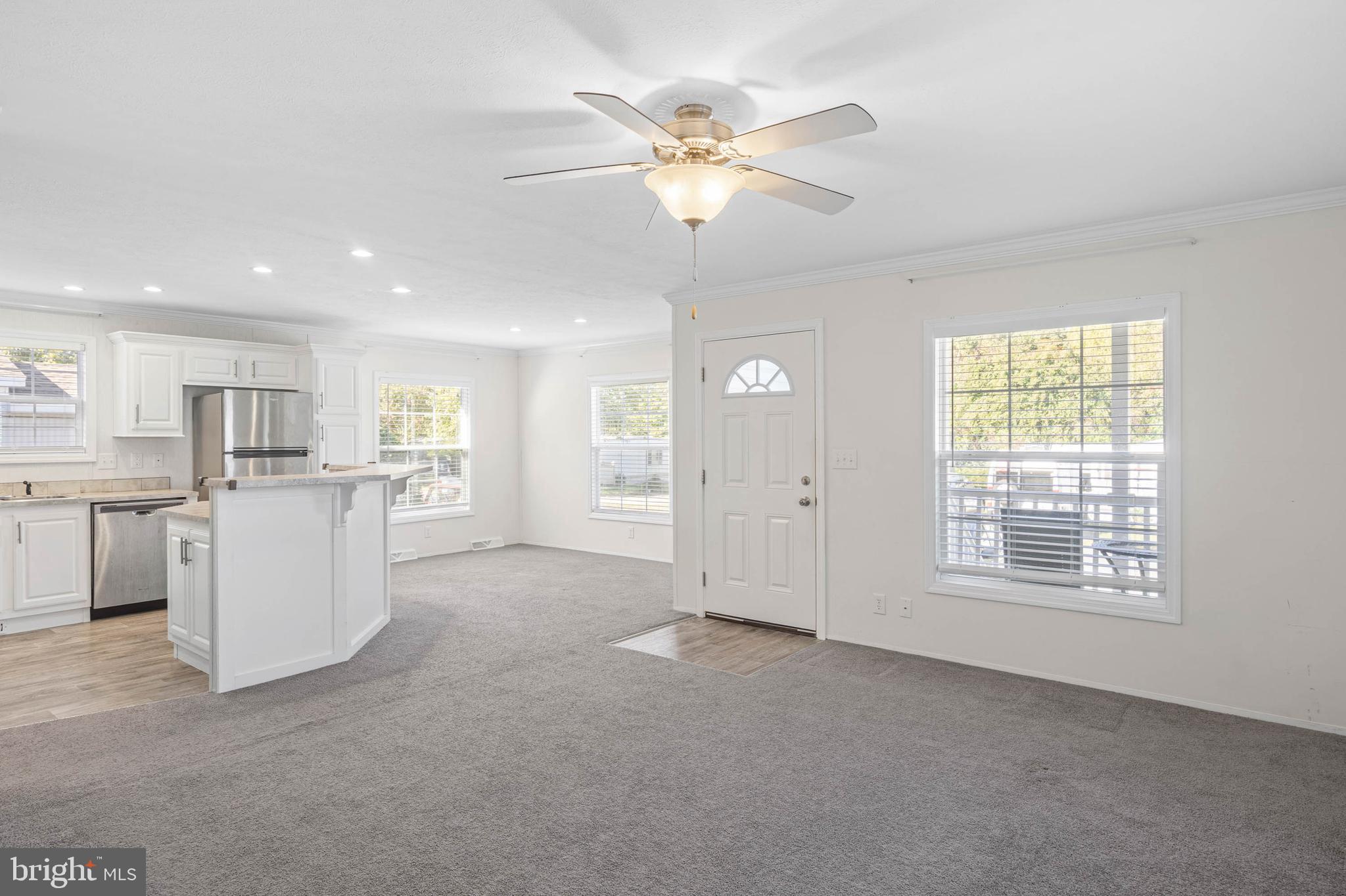 17247 Pine Water Drive Lewes, DE 19958 - Photo 8 of 32 a view of an empty room with a window
