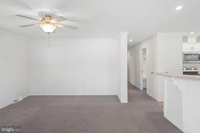 a view of a kitchen with a sink