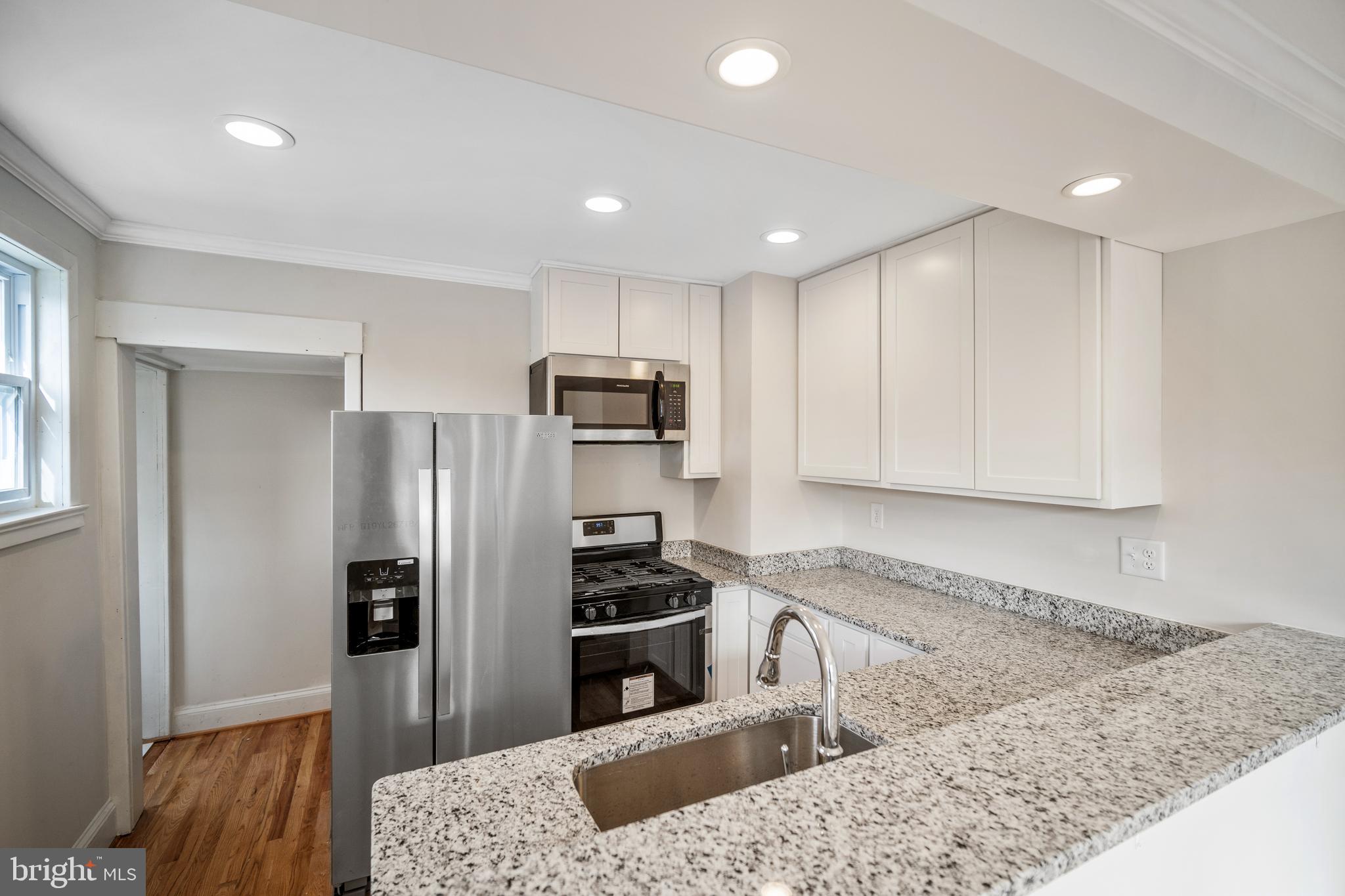 4110 Belle Grove Road Baltimore, MD 21225 - Photo 1 of 34 Large sink, granite counters, gas stove, stainless