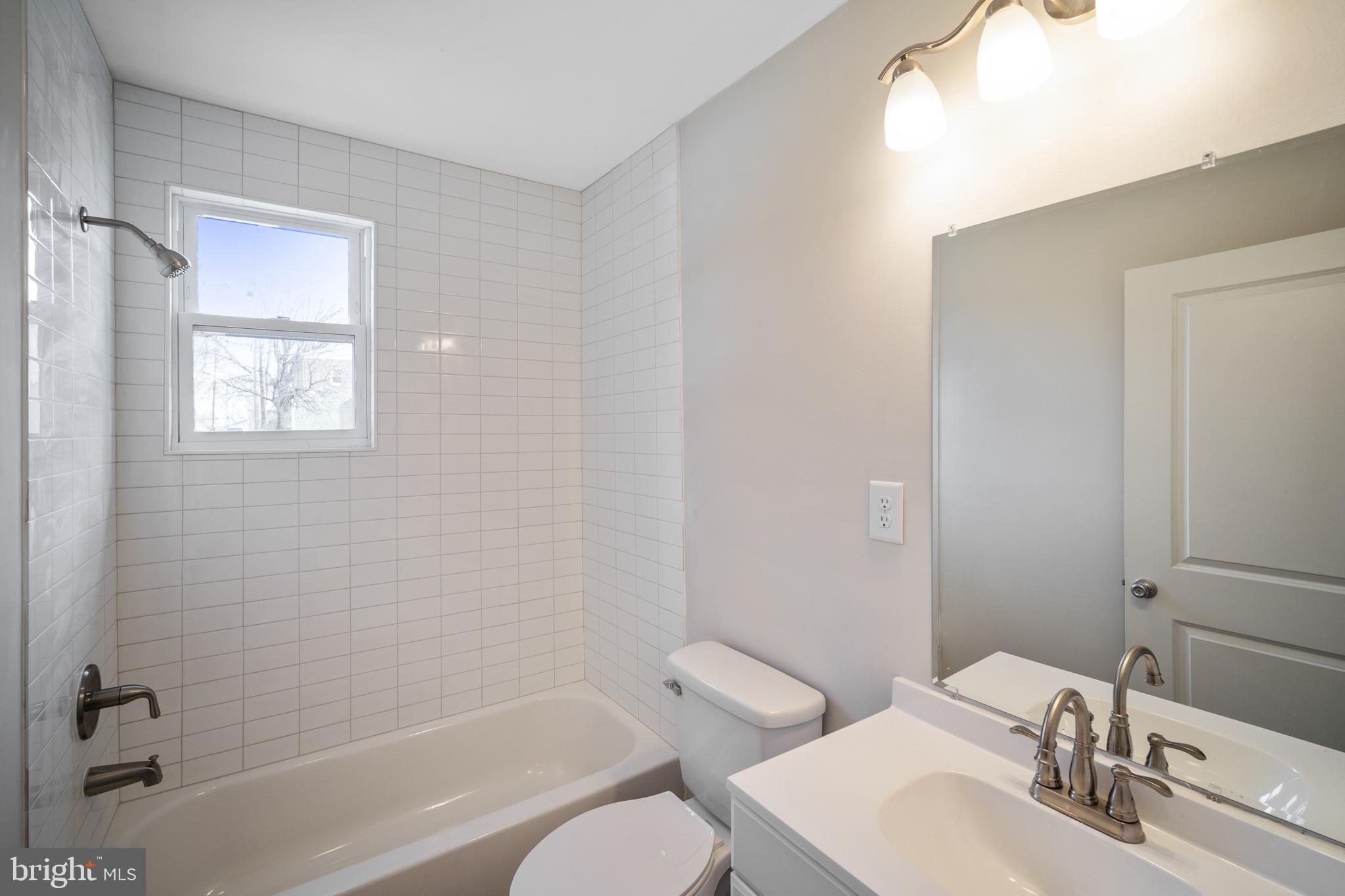 4110 Belle Grove Road Baltimore, MD 21225 - Photo 16 of 34 main floor full bathroom