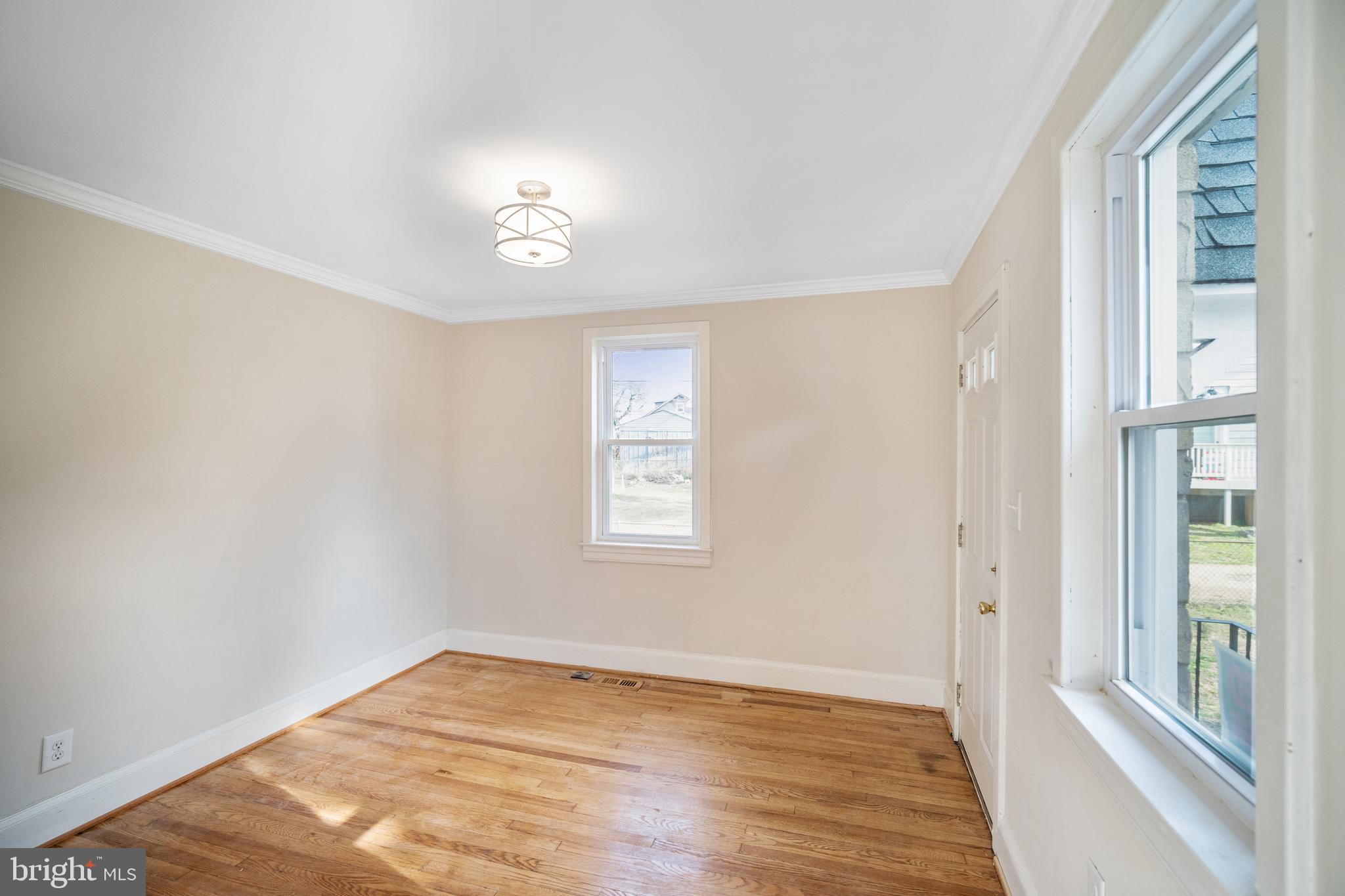 4110 Belle Grove Road Baltimore, MD 21225 - Photo 7 of 34 Tons of natural lighting in living room