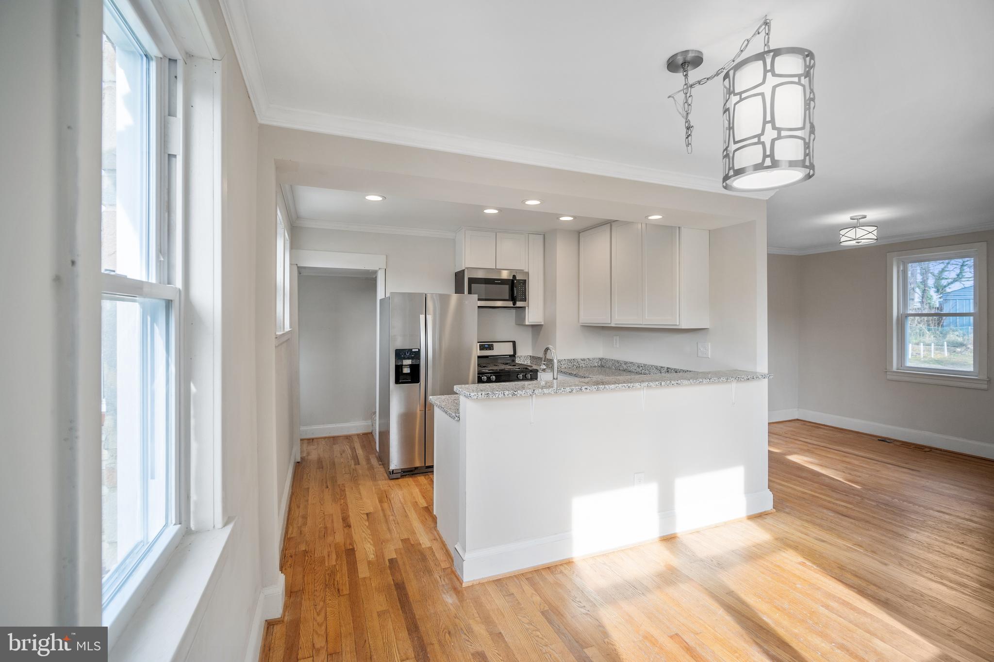 4110 Belle Grove Road Baltimore, MD 21225 - Photo 9 of 34 Naturally lit kitchen / dining area