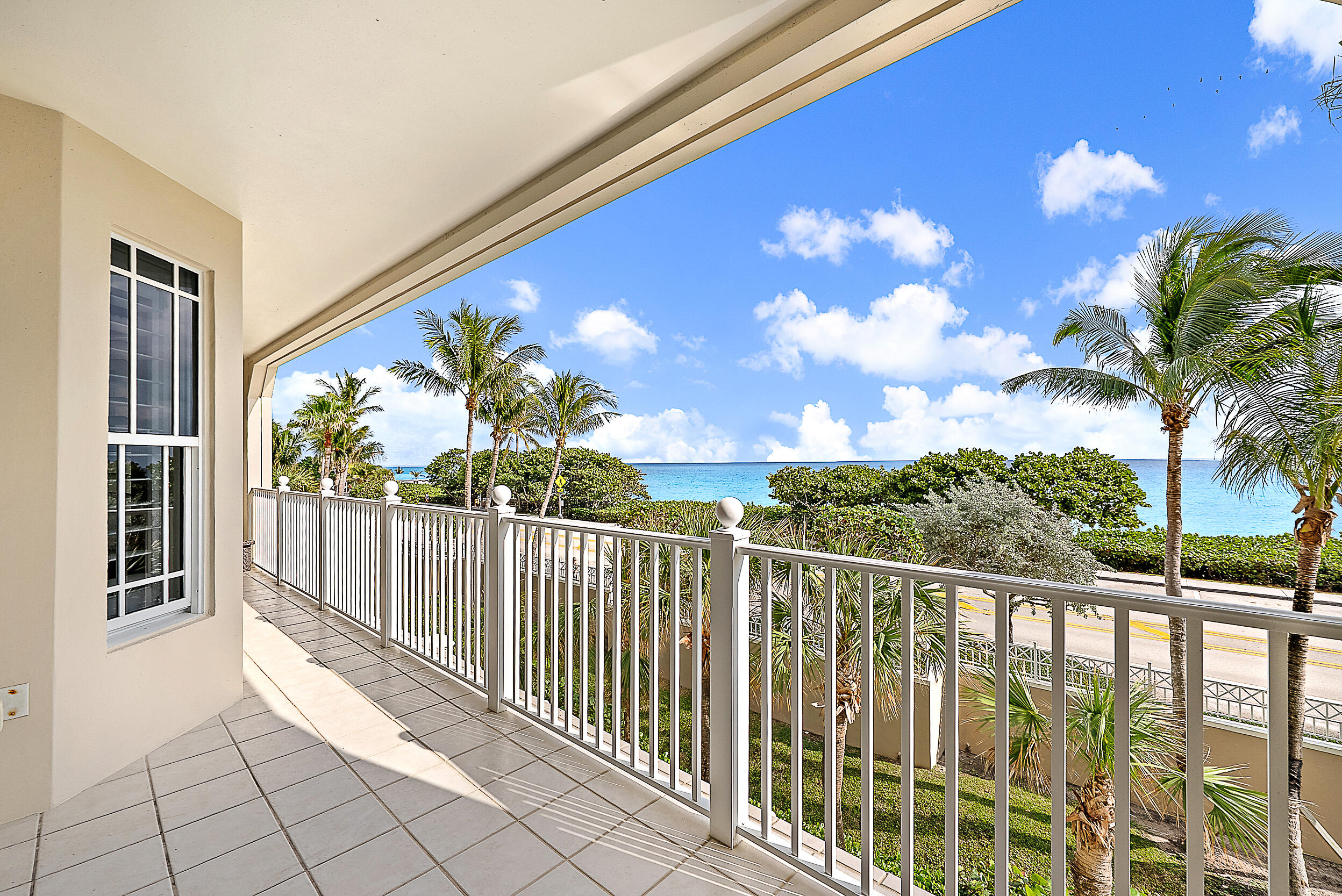 221 Ocean Grande Boulevard, Unit 407 Jupiter, FL 33477 - Photo 4 of 39 a view of balcony with wooden floor