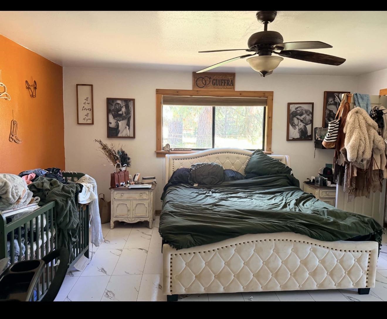 15440 Old Wagon Road Crescent Mills, CA 95934 - Photo 10 of 19 a bedroom with furniture and a window