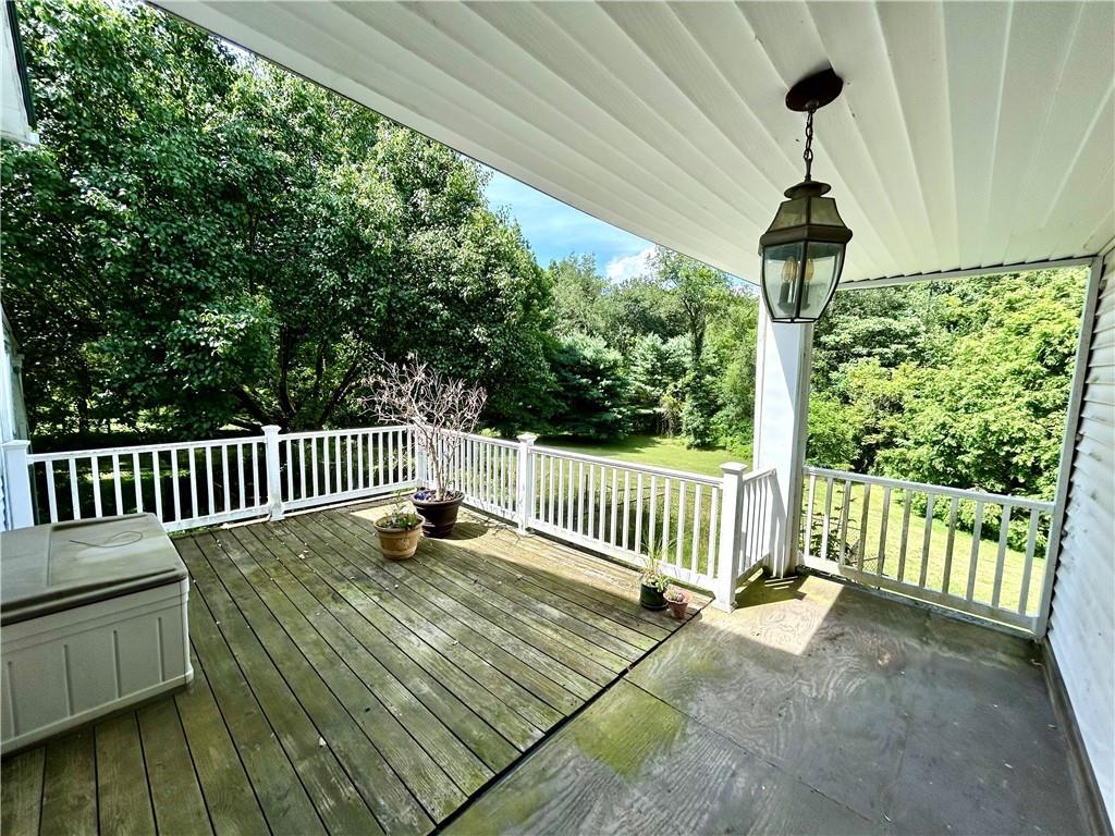 239 Marshall Road Oakdale, PA 15071 - Photo 35 of 41 a view of a balcony with wooden floor