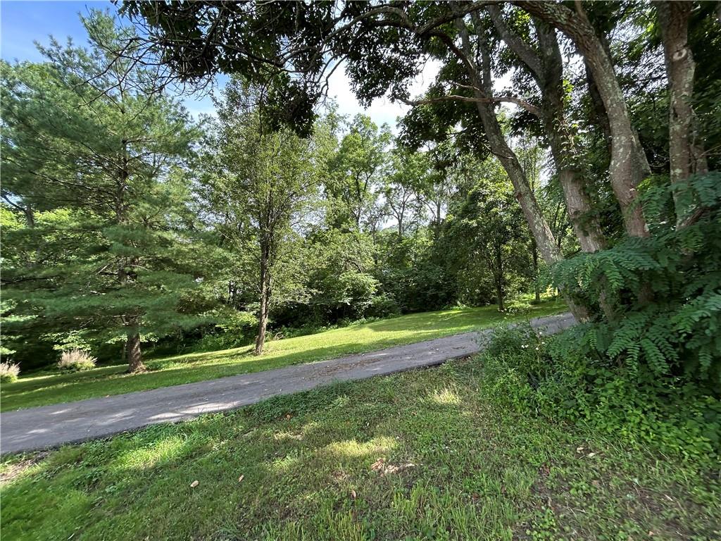 239 Marshall Road Oakdale, PA 15071 - Photo 4 of 41 a view of a tennis ground with large trees