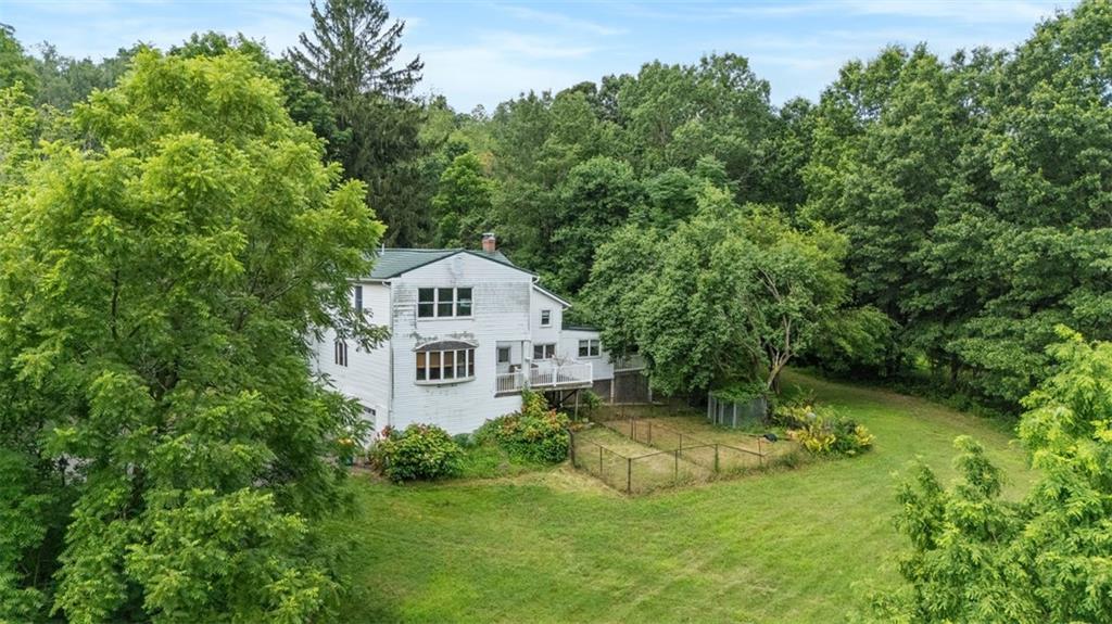239 Marshall Road Oakdale, PA 15071 - Photo 7 of 41 a view of a house with a yard balcony and sitting area