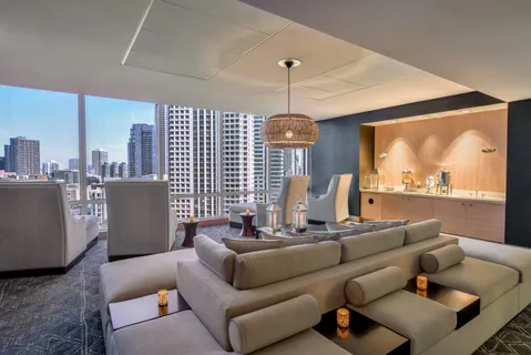 a living room with furniture and a window