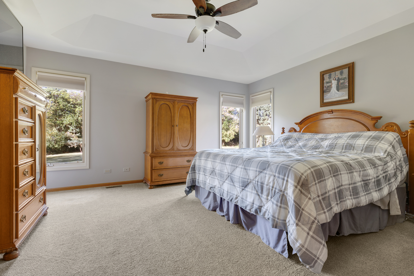 10317 Ridge Lane Huntley, IL 60142 - Photo 24 of 42 a bedroom with a bed and a window