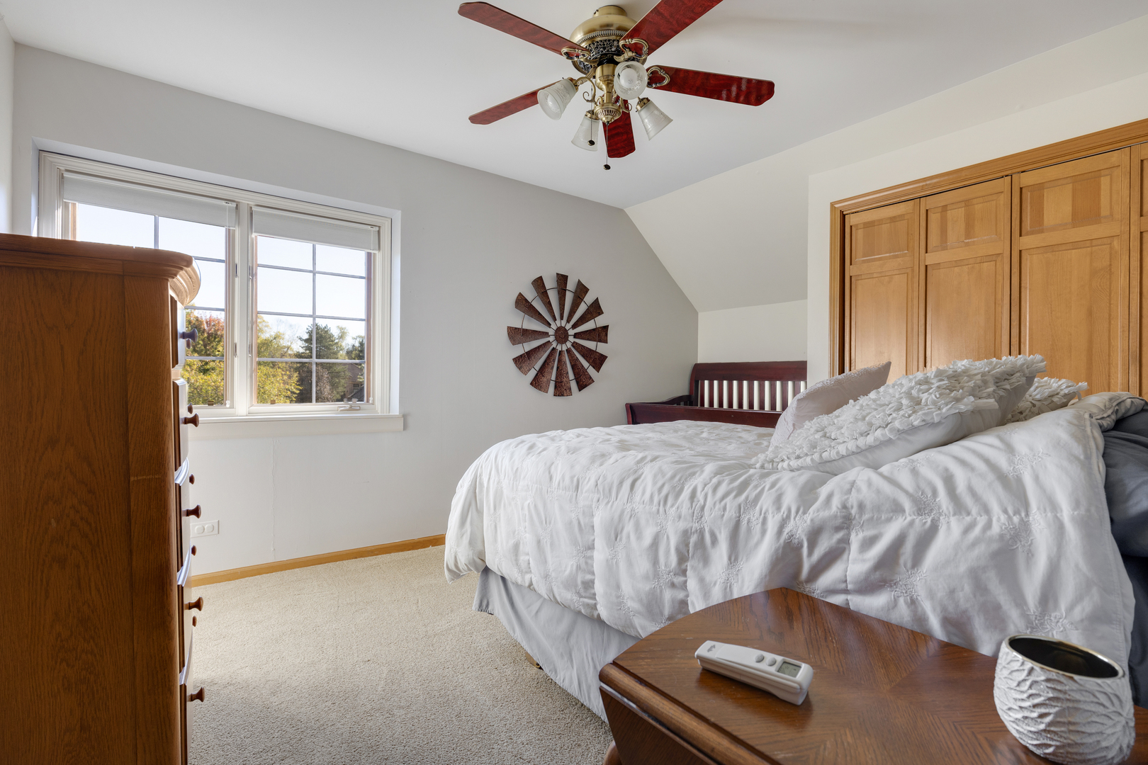 10317 Ridge Lane Huntley, IL 60142 - Photo 27 of 42 a bedroom with a bed and window