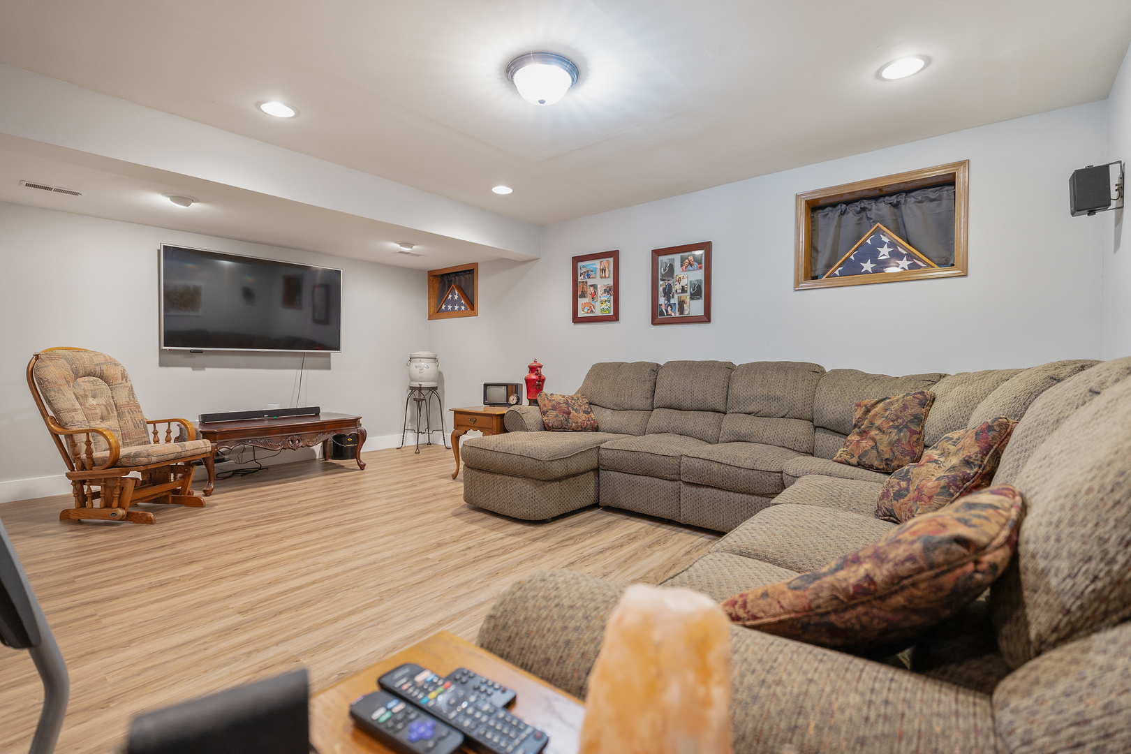 10317 Ridge Lane Huntley, IL 60142 - Photo 31 of 42 a living room with furniture and a flat screen tv