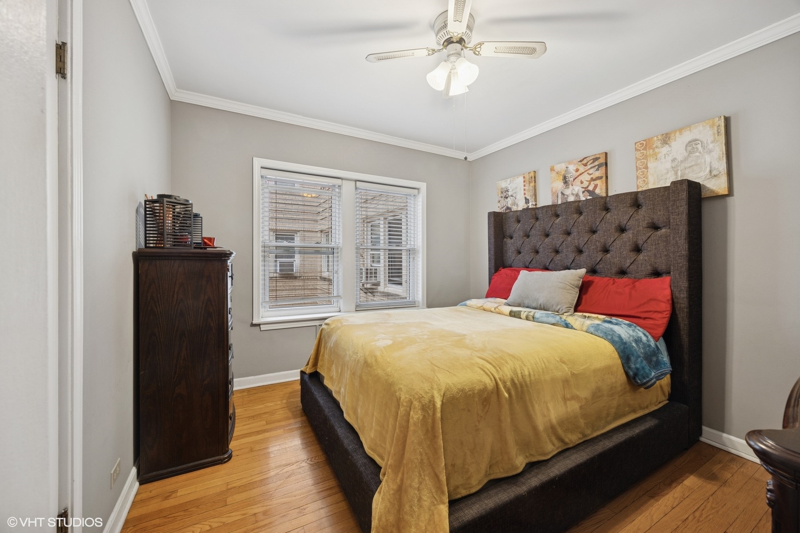 100 Pine Avenue, Unit 3 Riverside, IL 60546 - Photo 11 of 14 a bed sitting in a bedroom next to a window