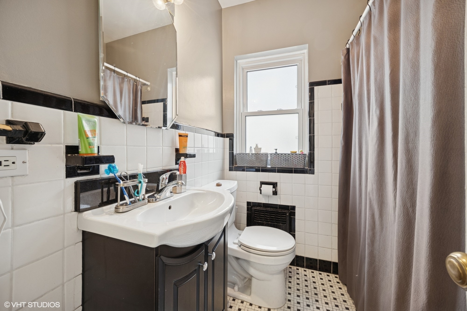 100 Pine Avenue, Unit 3 Riverside, IL 60546 - Photo 13 of 14 a bathroom with a sink a toilet and mirror