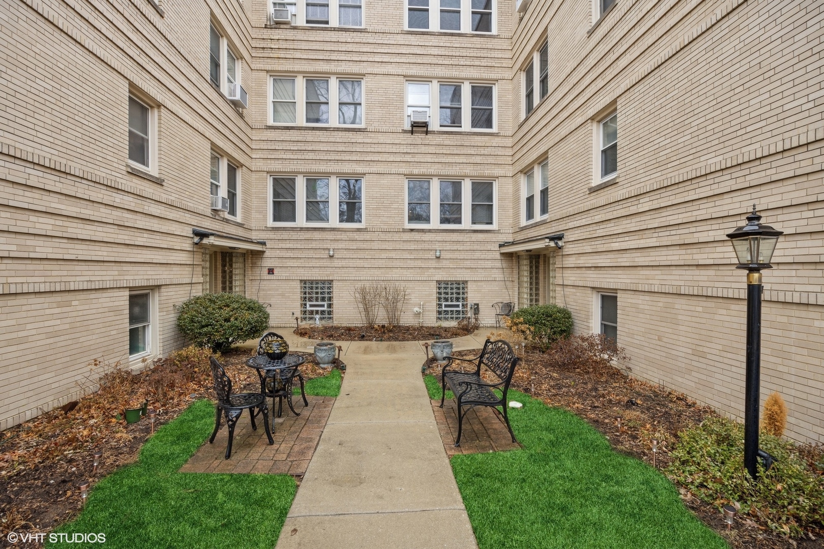 100 Pine Avenue, Unit 3 Riverside, IL 60546 - Photo 3 of 14 a view of a house with patio outdoor dining space