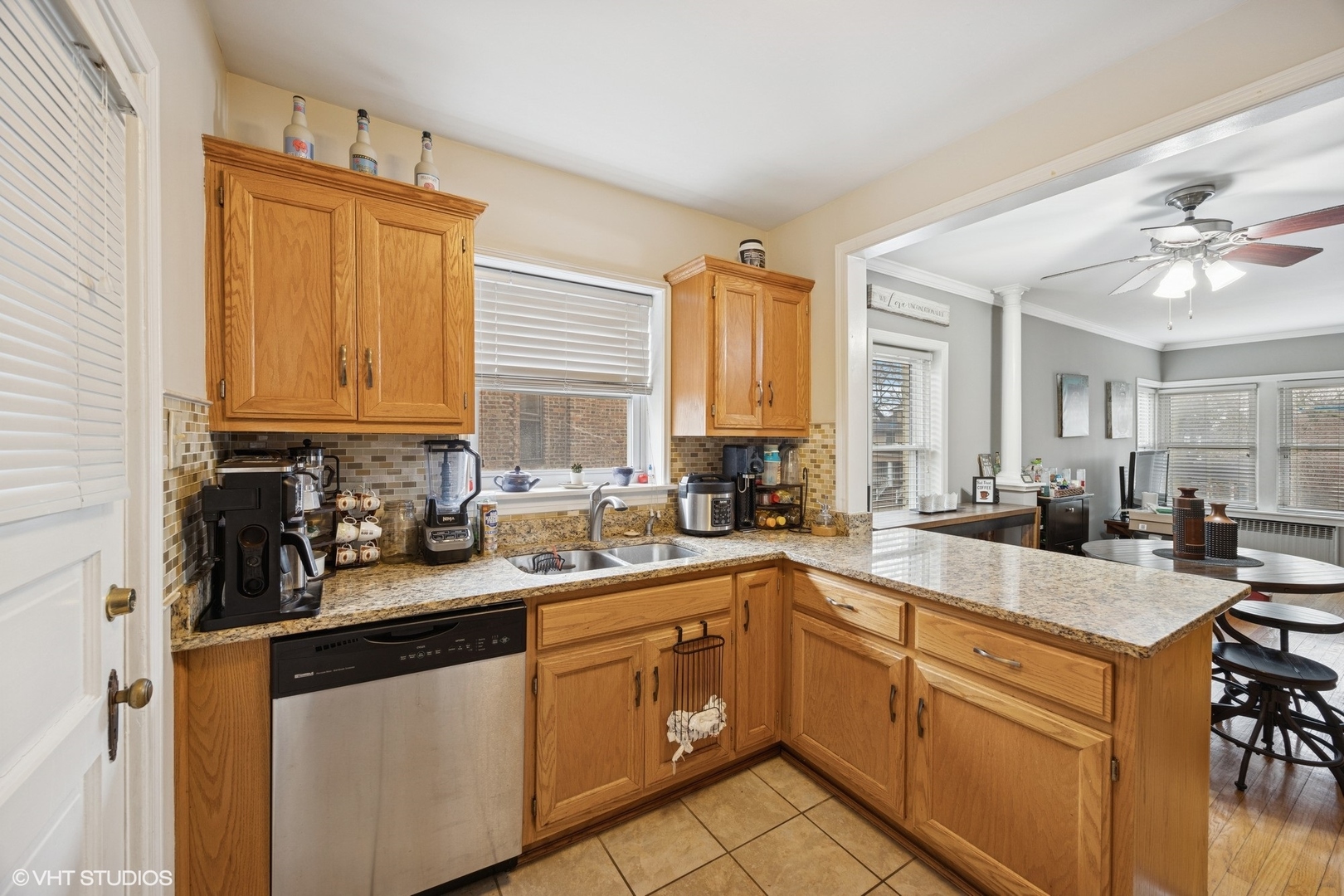 100 Pine Avenue, Unit 3 Riverside, IL 60546 - Photo 6 of 14 a kitchen with a sink stove and cabinets