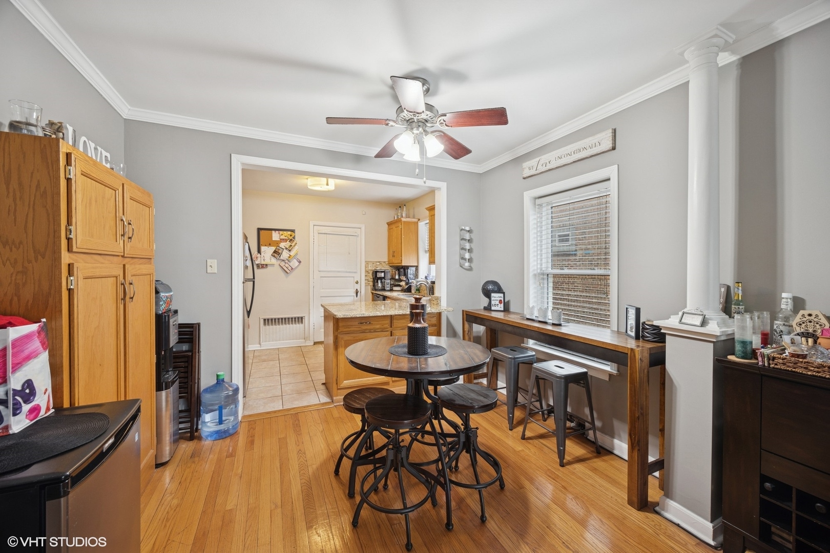 100 Pine Avenue, Unit 3 Riverside, IL 60546 - Photo 7 of 14 a view of a dining room with furniture and a chandelier fan