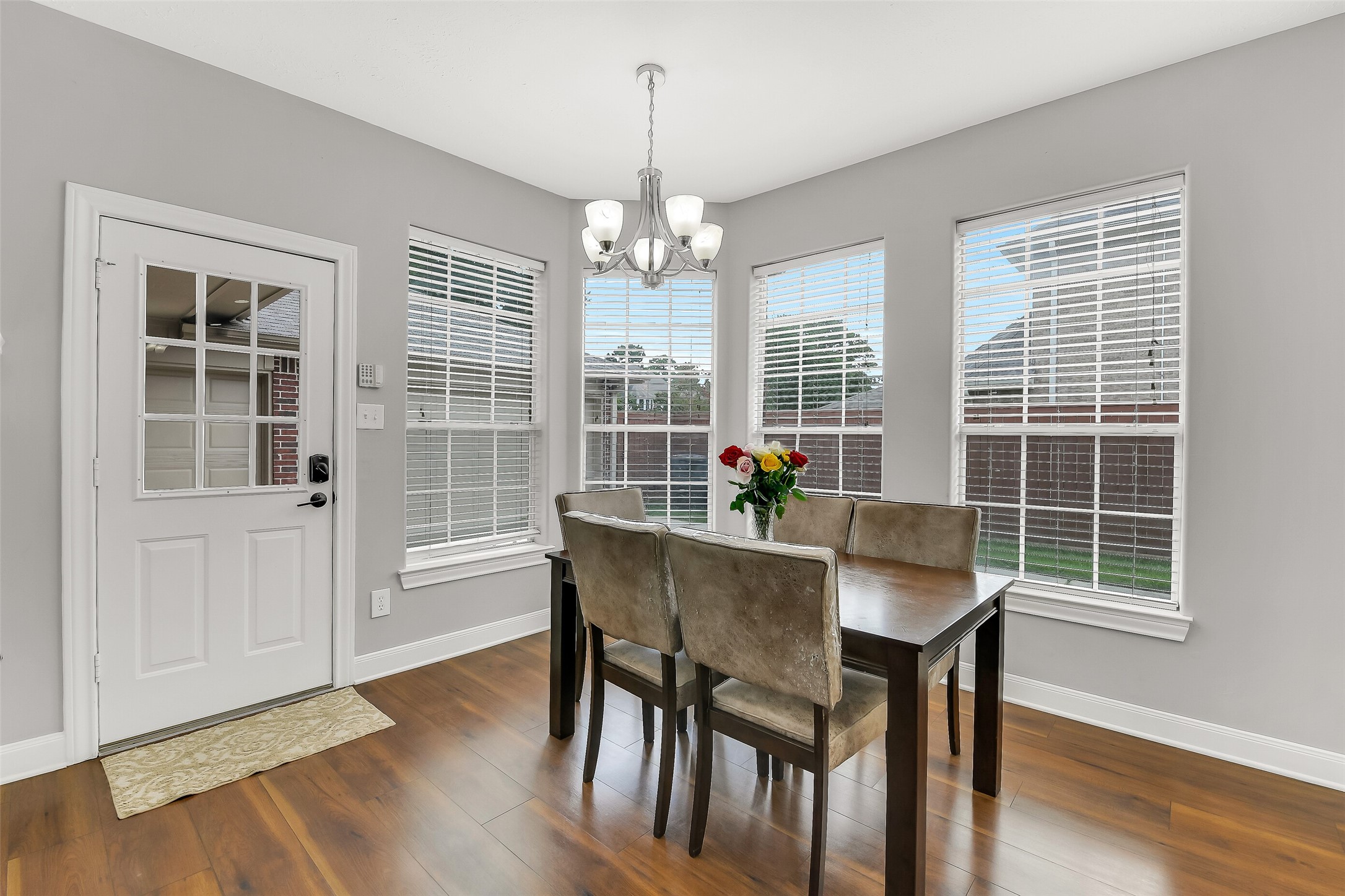 18414 Bull Pine Drive Spring, TX 77379 - Photo 15 of 43 a view of a dining room with furniture window and wooden floor