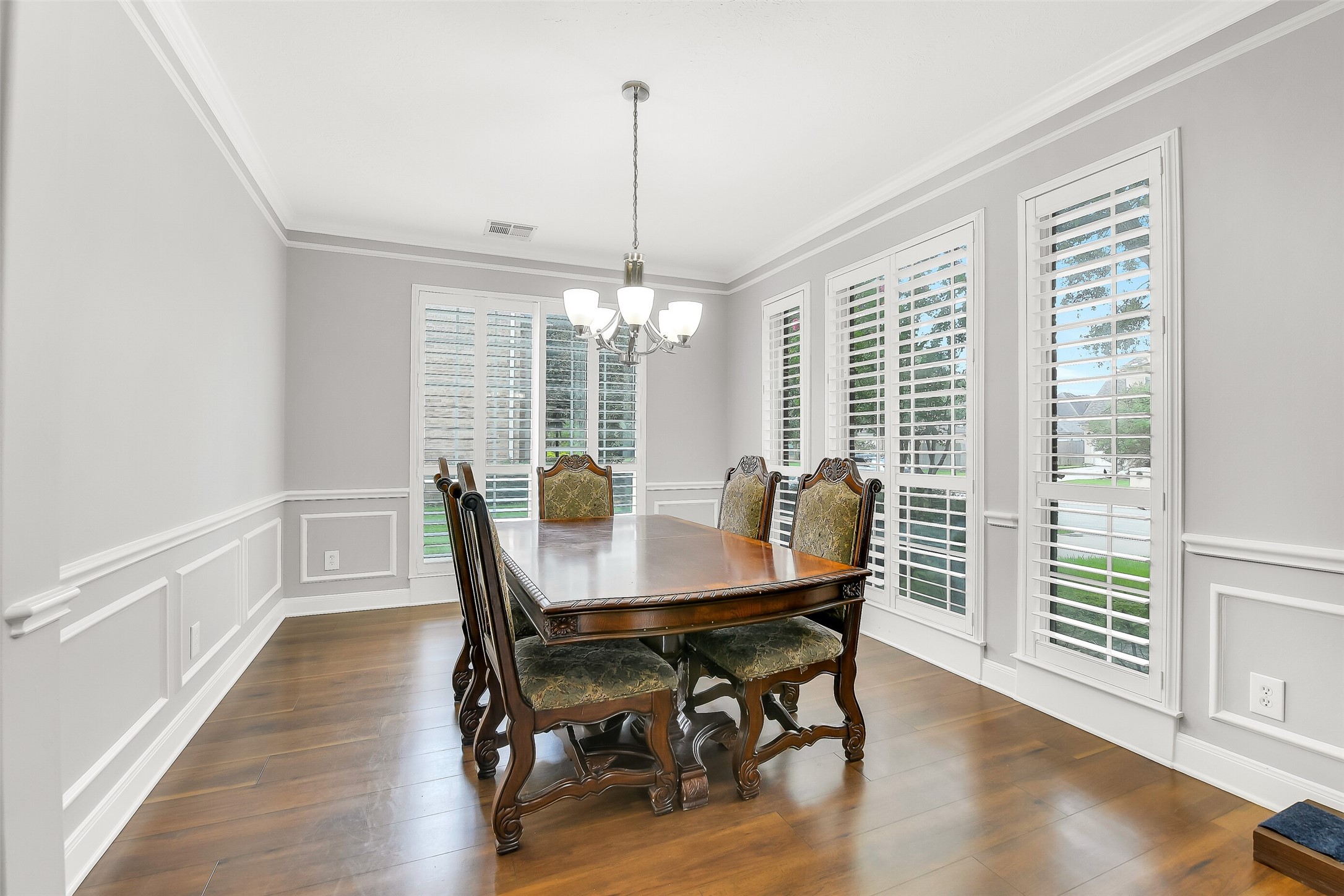 18414 Bull Pine Drive Spring, TX 77379 - Photo 16 of 43 a view of a dining room with furniture window and wooden floor