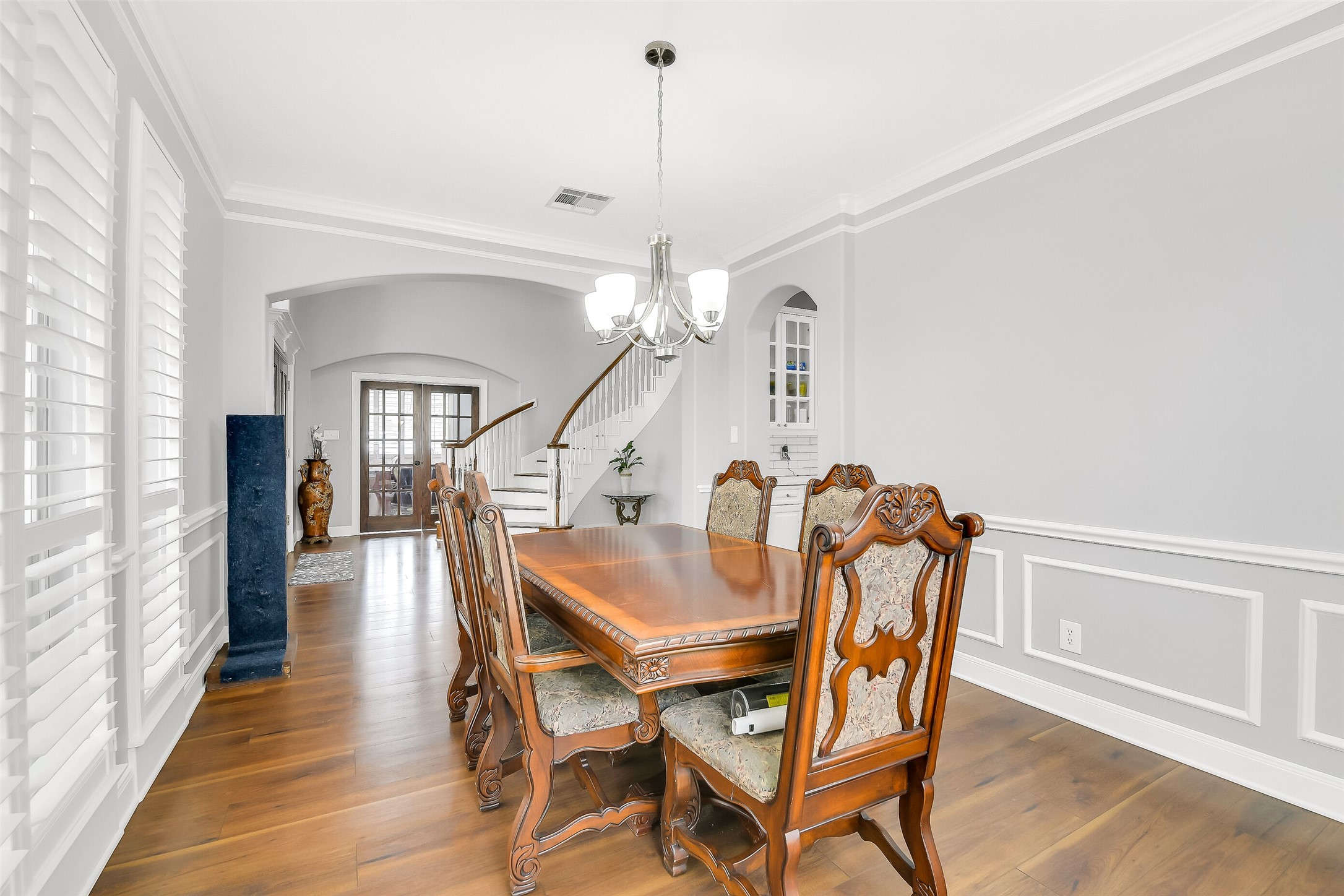 18414 Bull Pine Drive Spring, TX 77379 - Photo 17 of 43 a dining room with furniture and wooden floor