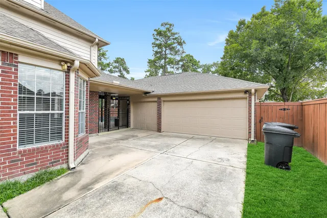 a front view of a house with garage