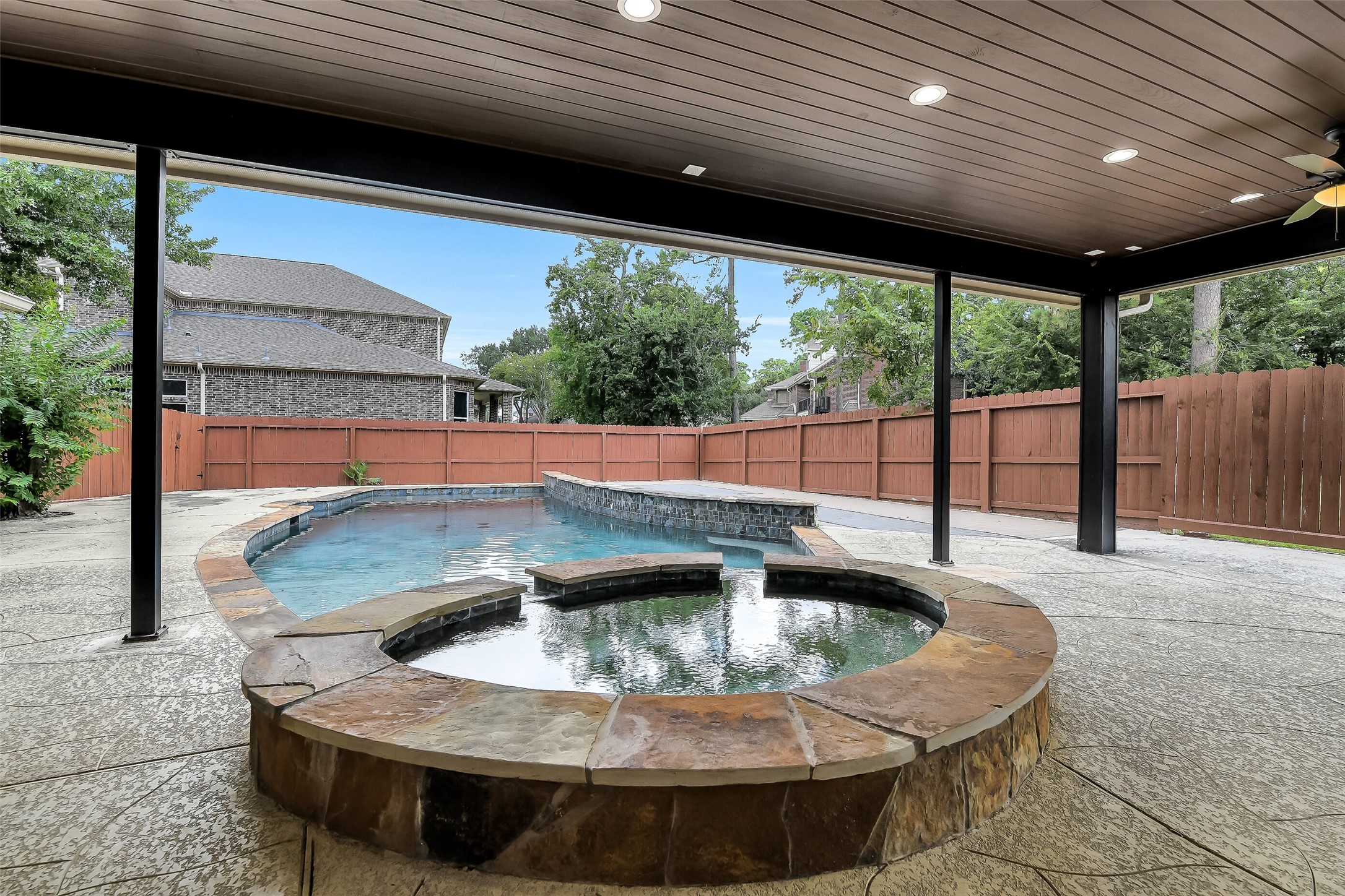 18414 Bull Pine Drive Spring, TX 77379 - Photo 37 of 43 a view of swimming pool with a couches in patio