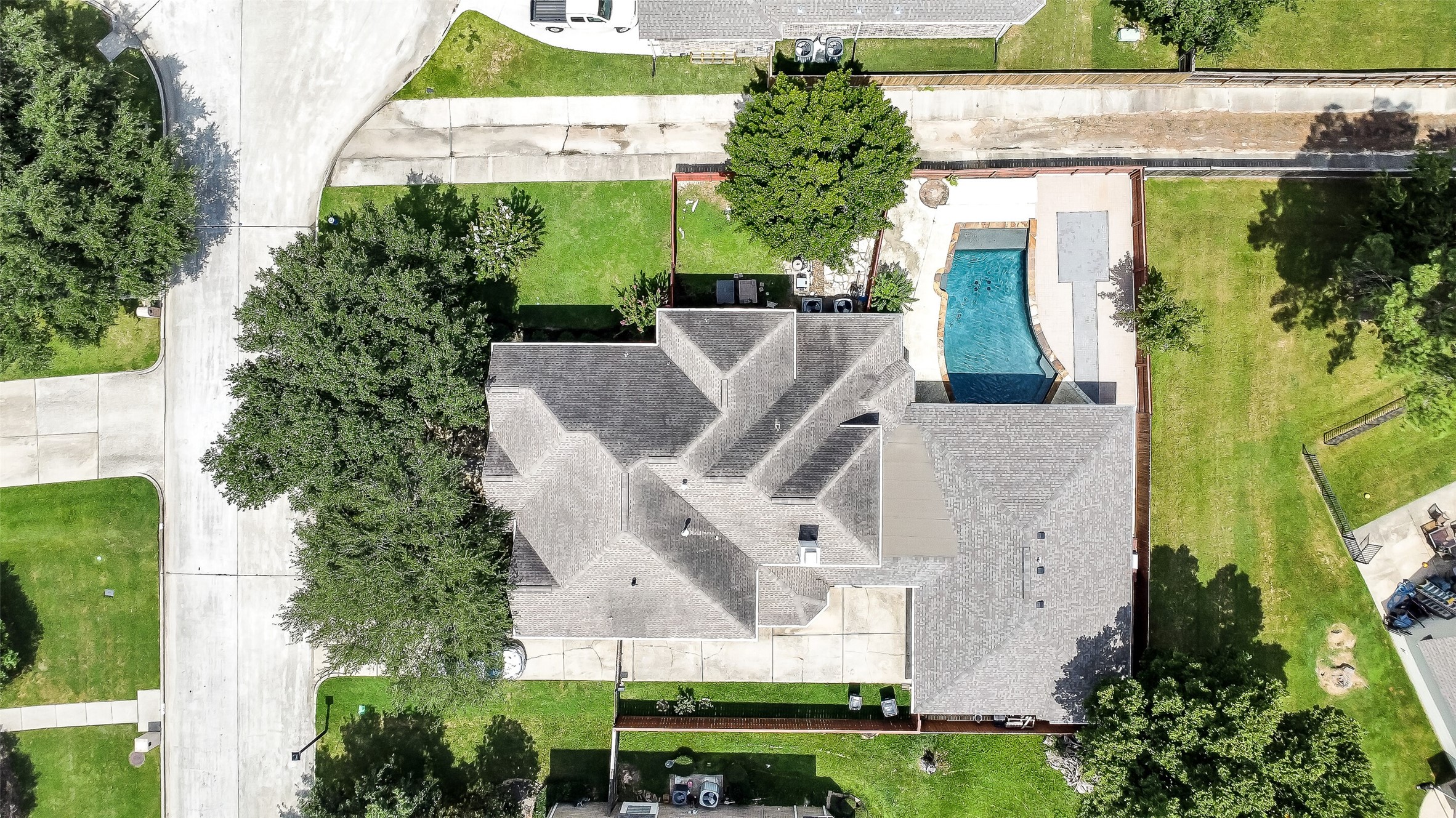18414 Bull Pine Drive Spring, TX 77379 - Photo 6 of 43 an aerial view of a house with a yard and potted plants