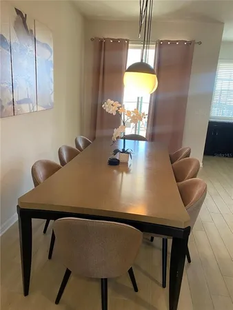 a view of a dining room with furniture