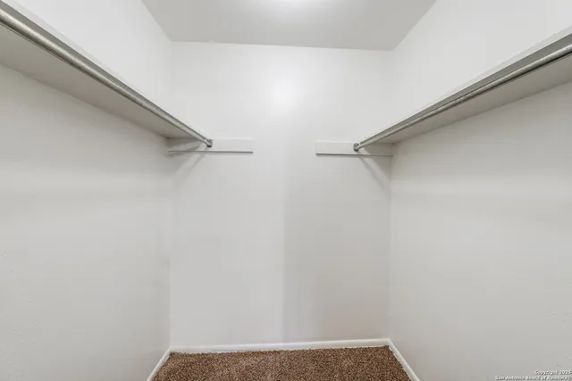 a view of small space with racks on the wall