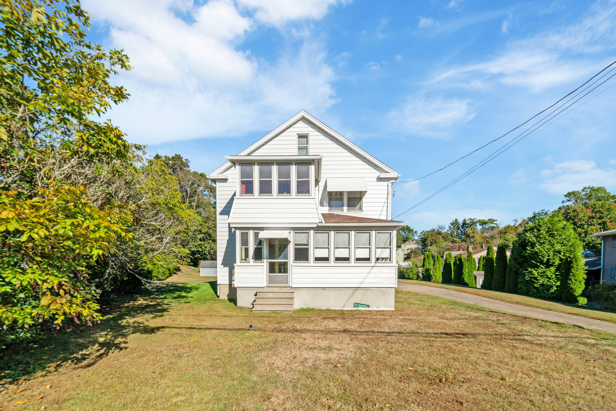 a house view with a garden space