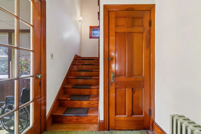 a children room with furniture and a couch