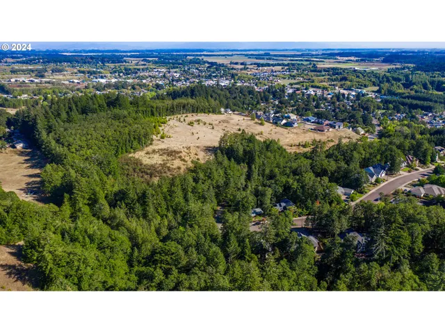 a view of an ocean and city