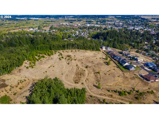 a view of a lake with a yard