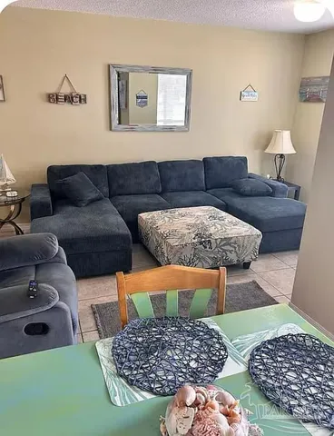 a living room with a couch and a coffee table