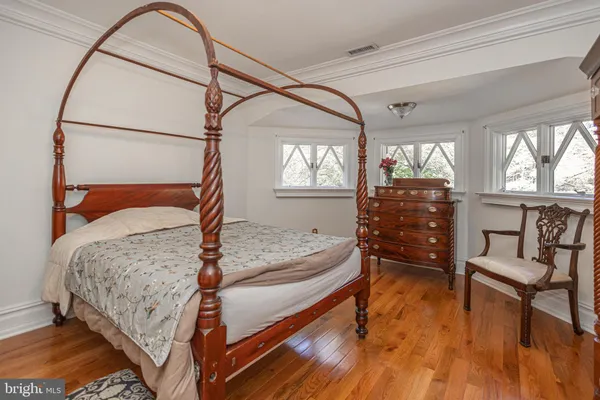 a white bath tub sitting next to a window