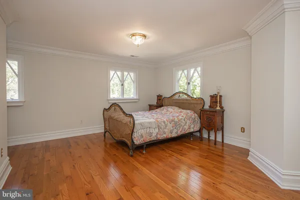 a spacious bathroom with a bathtub and a sink