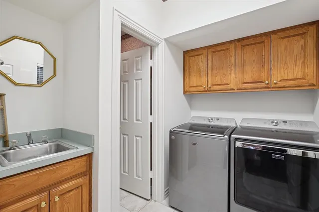 a kitchen with a stove and a sink