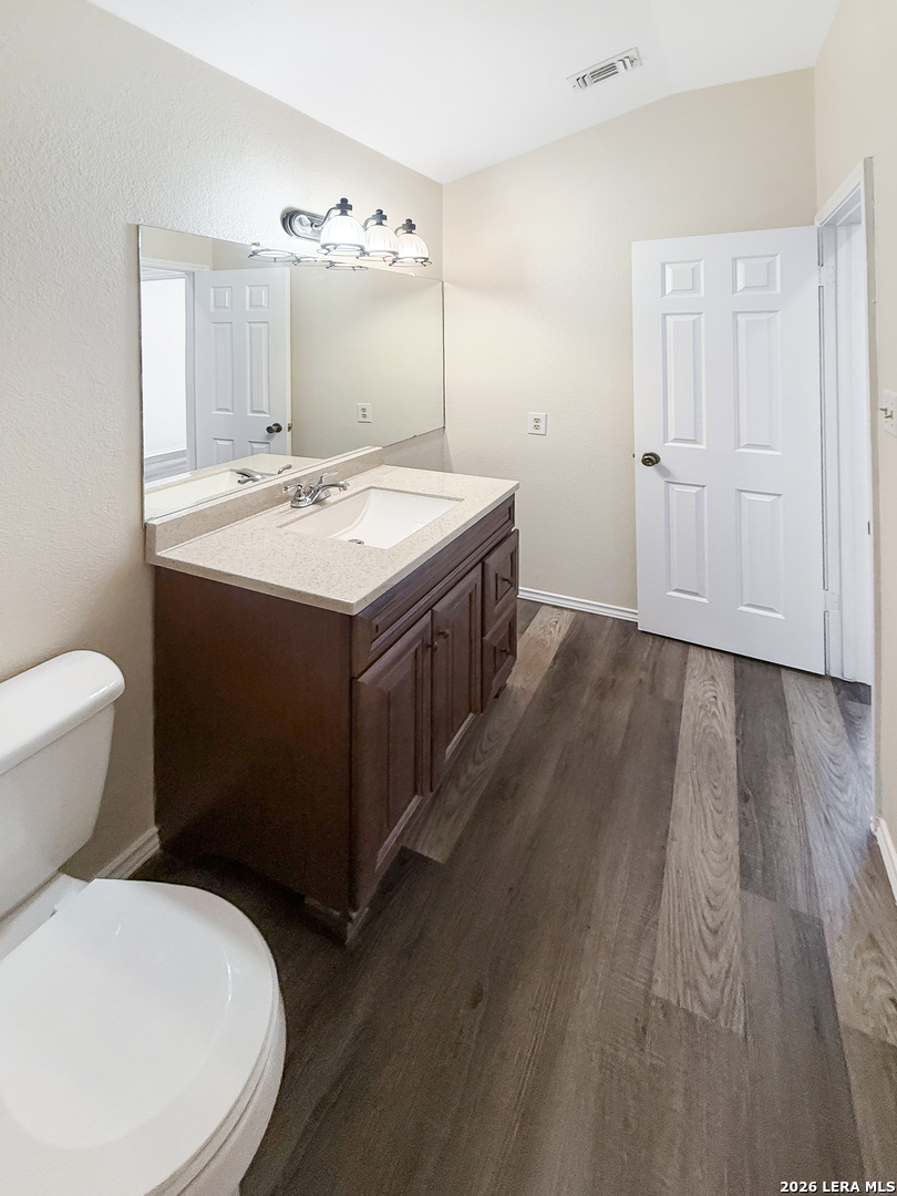9808 Delta Ridge Drive Converse, TX 78109 - Photo 23 of 38 a bathroom with a sink and mirror