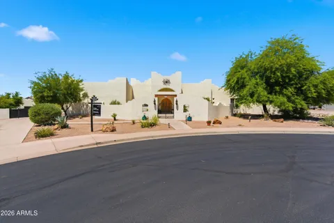 an aerial view of residential houses and outdoor space