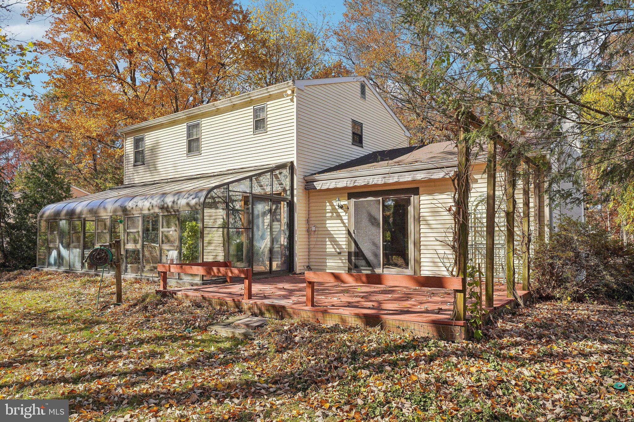 130 Forrest Road Telford, PA 18969 - Photo 33 of 42 Back of home showing deck and sunroom