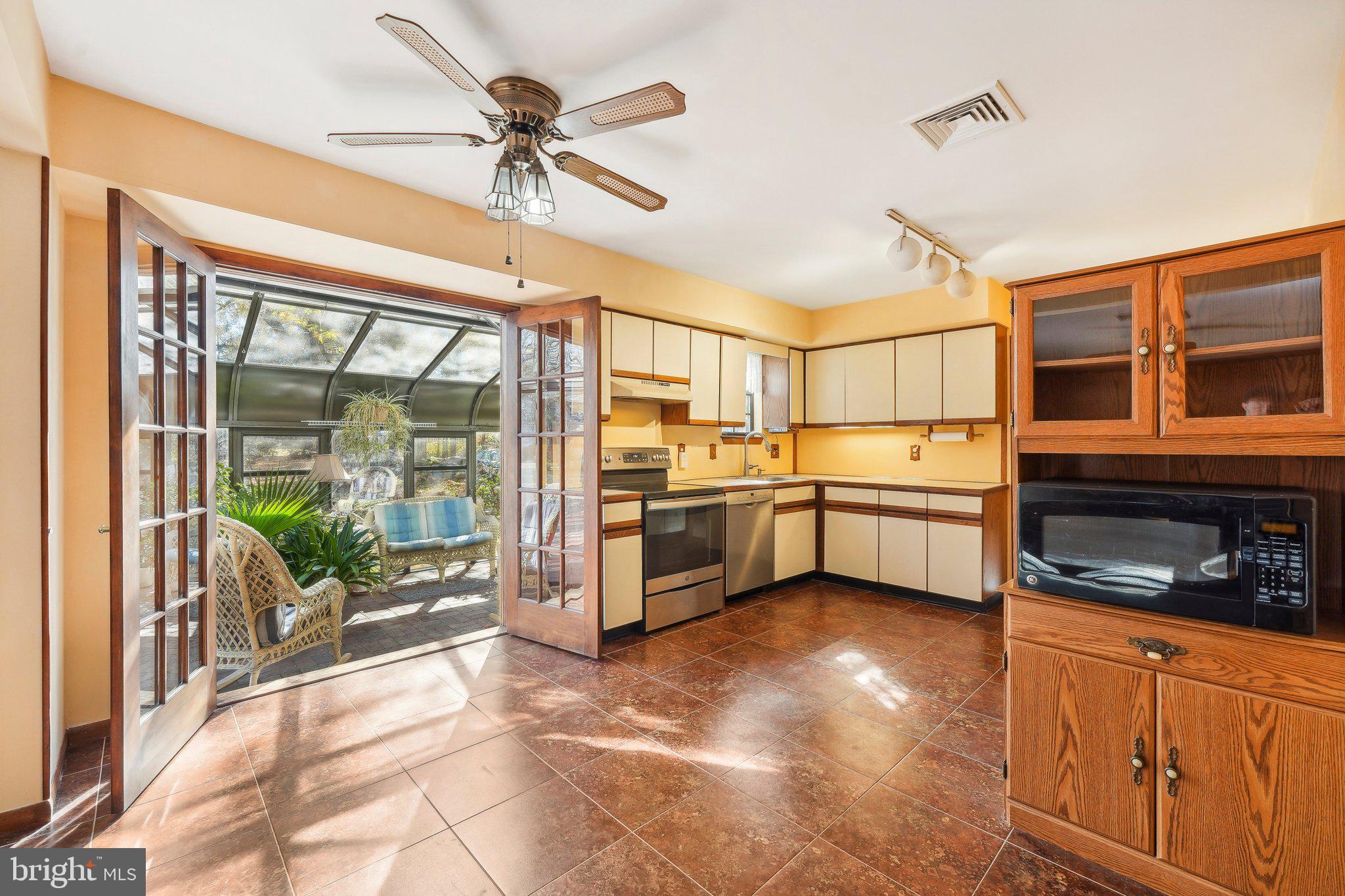 130 Forrest Road Telford, PA 18969 - Photo 6 of 42 Kitchen with French doors to sun room
