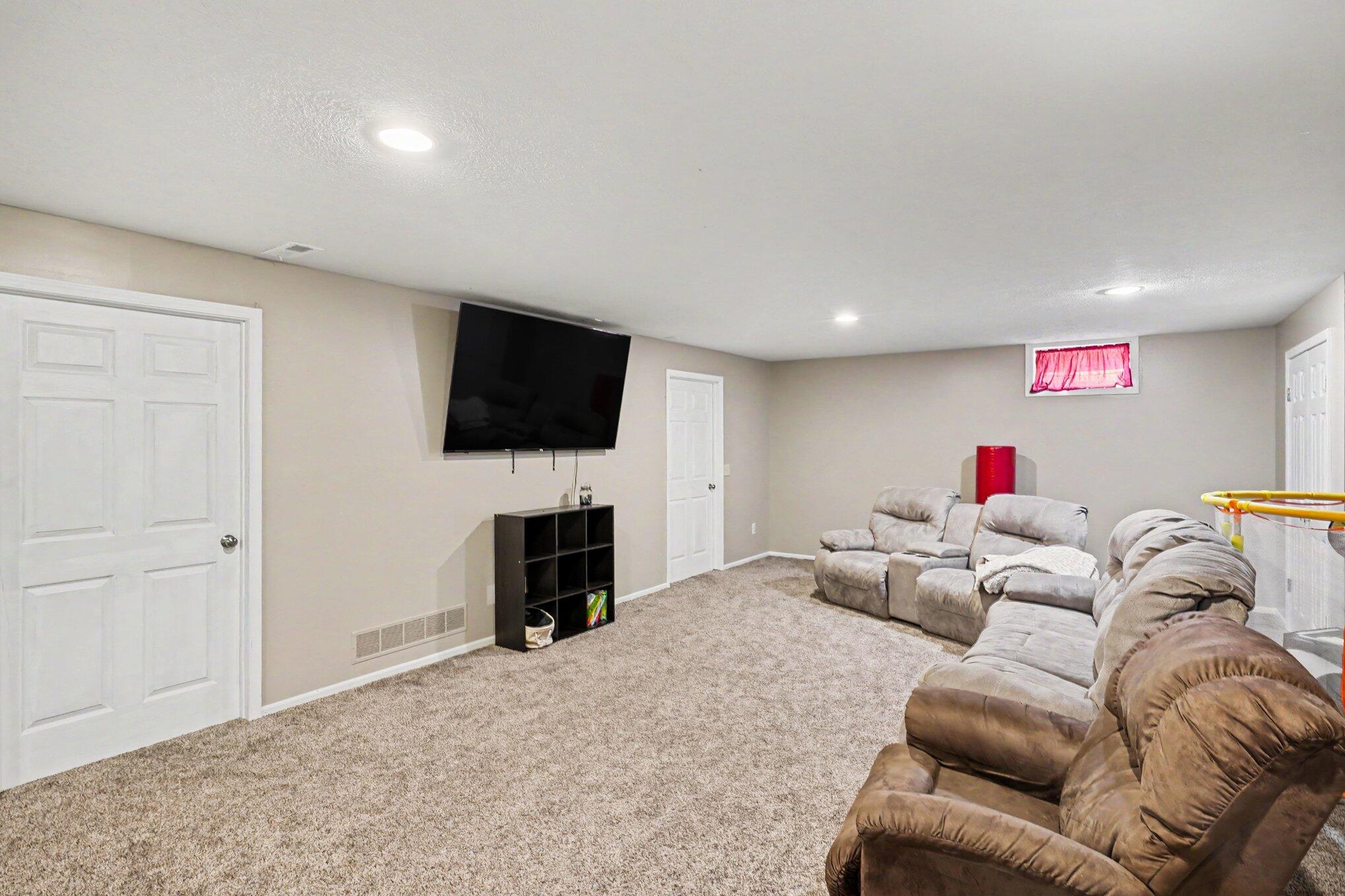 10464 Hankerd Road Pleasant Lake, MI 49272 - Photo 16 of 28 Basement Rec Room