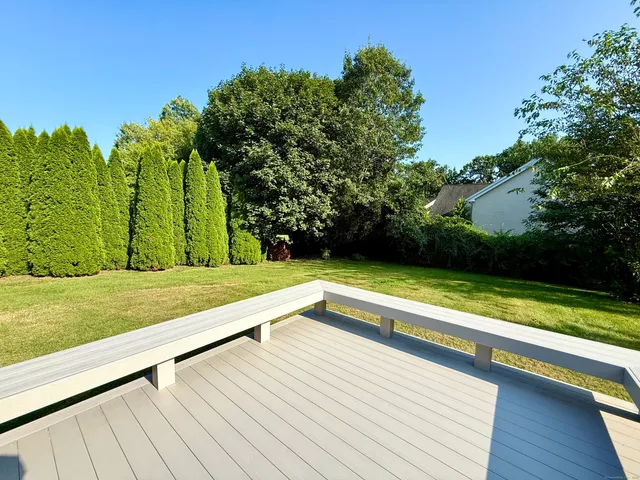 a view of swimming pool with a backyard