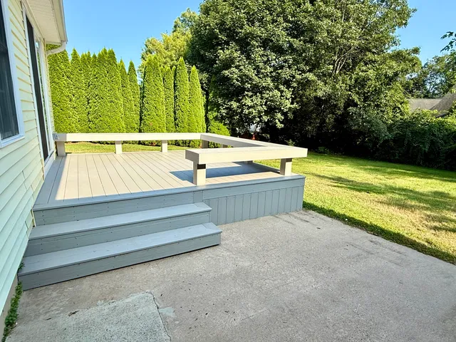 a view of swimming pool with a yard