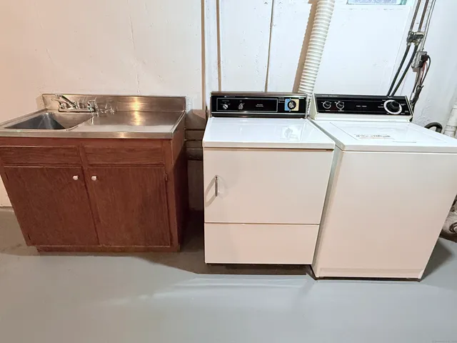 a utility room with dryer and washer